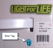A small blue dot on the product packaging.